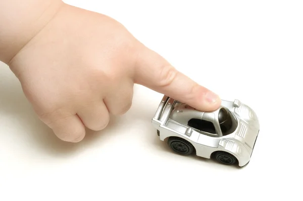 stock image Children hand and toy car