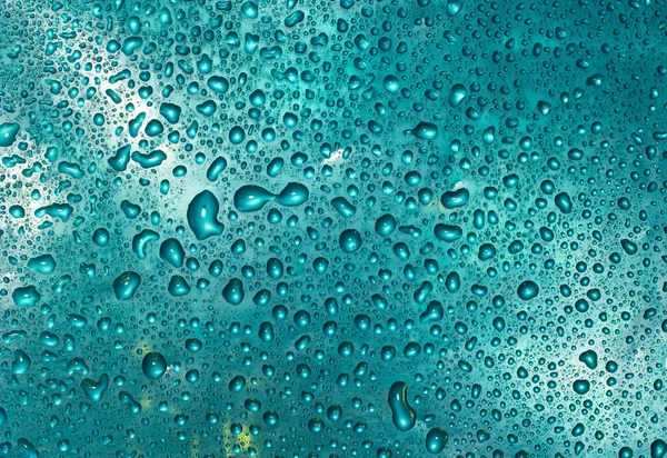 Gotas de água azul Fotografia De Stock