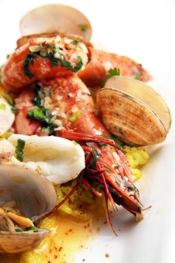 Photograph of seafood paella portion clipart