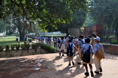 Pupils in the Red Fort, Old Delhi, India. clipart