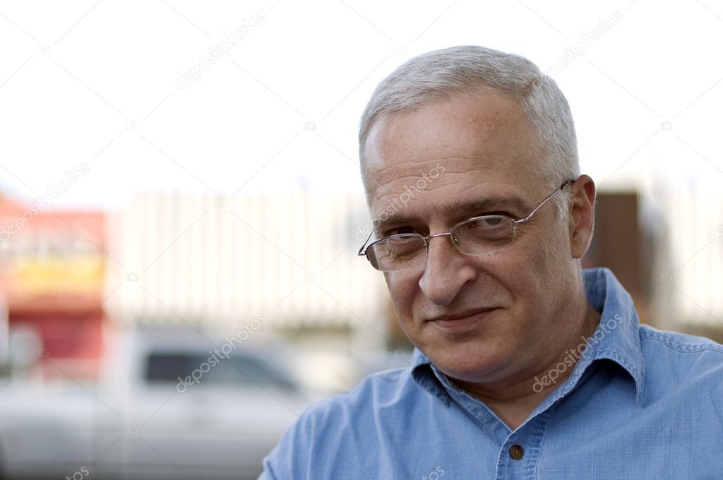 Portrait of a happy mature man, shallow depth of field