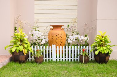 Small flower fence in a house clipart