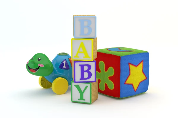 Blok mainan kayu mengeja bayi dengan mainan bayi di latar belakang — Stok Foto