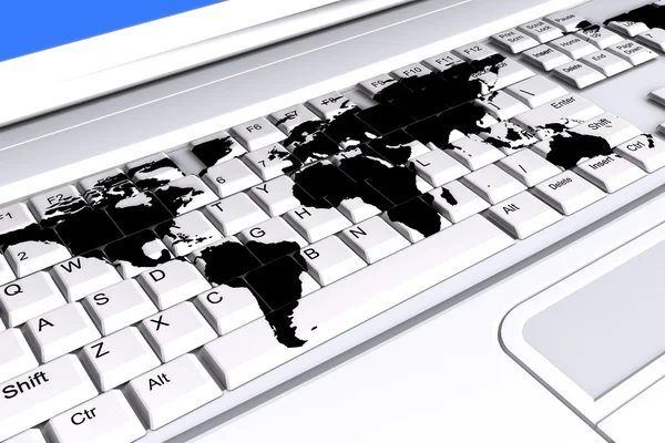 Laptop toetsenbord met een wereldkaart op de toetsen — Stockfoto