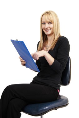 Beautiful blonde woman holding her clipboard clipart