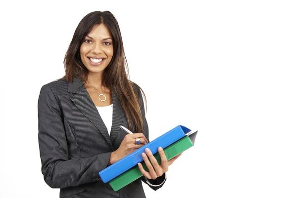 Beautiful brunette woman holding some files — Stock Photo, Image