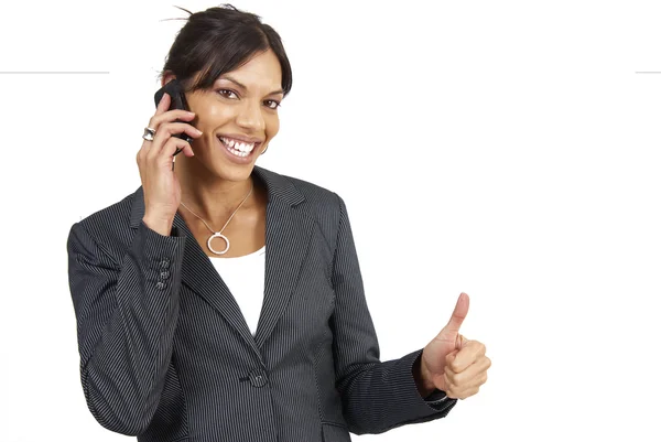 Beautiful brunette woman showing a thumbs up — Stock Photo, Image