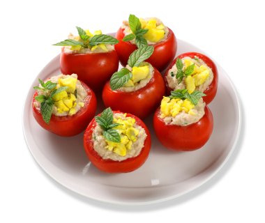 Tomatoes stuffed on white clipart