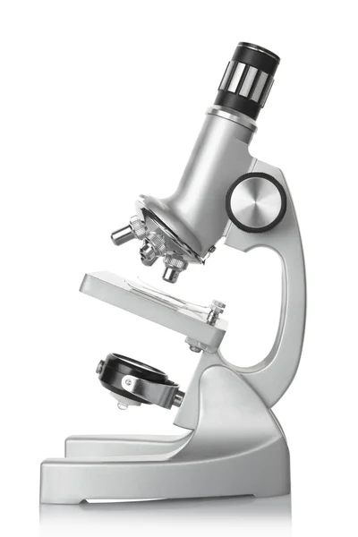 Microscópio isolado em branco — Fotografia de Stock