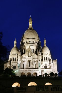 Basilique du Sacre Coeur in Montmartre, night view, Paris, France clipart
