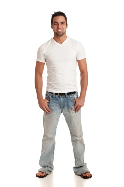 Dorywczo młody człowiek w dżinsy i t-shirt. łapka na biały. — Zdjęcie stockowe