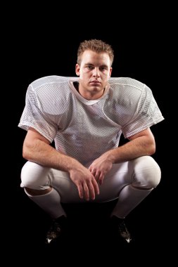 Amerikan futbolu oyuncusu. siyah ateş studio.