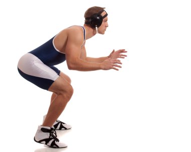 Wrestler in a blue singlet. Studio shot over white. clipart