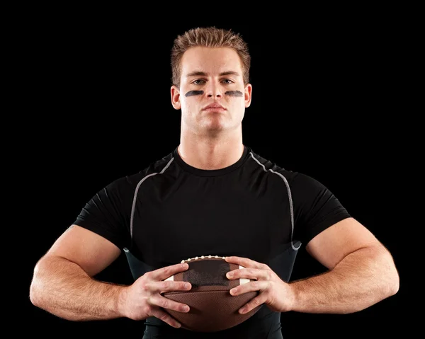 American football player. Studio shot over black. — Stock Photo, Image