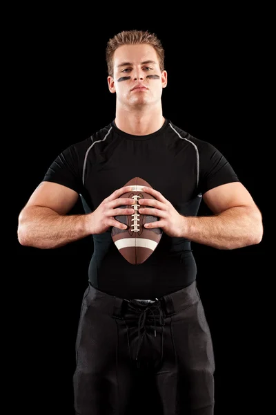 Amerikai futball-játékosának. stúdió felvétel-fekete felett. — Stock Fotó