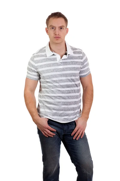Młody człowiek w pasiastą koszulę i dżinsy. łapka na biały. — Zdjęcie stockowe