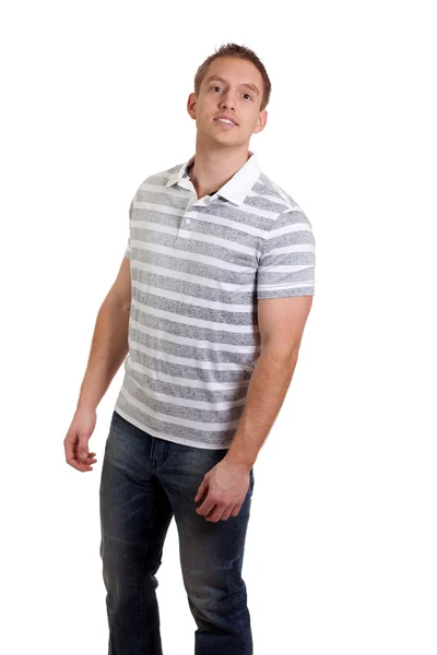 Młody człowiek w pasiastą koszulę i dżinsy. łapka na biały. — Zdjęcie stockowe