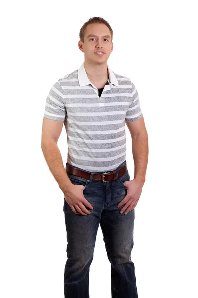 Jonge man in striped shirt en spijkerbroek. studio opname over Wit. — Stockfoto