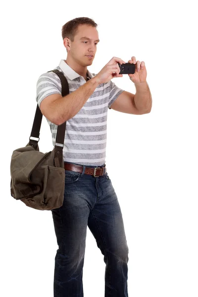 휴대 전화와 함께 젊은 남자. 흰색 위에 촬영 스튜디오. — 스톡 사진