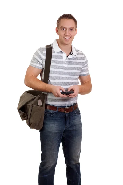 Junger Mann mit Handy. Studioaufnahme über Weiß. — Stockfoto