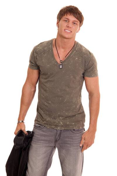 Мужчина в джинсах и футболке. Студия над белым
.