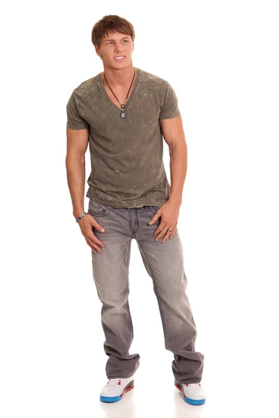 Człowiek w dżinsy i t-shirt. łapka na biały. — Zdjęcie stockowe
