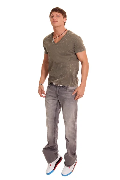 Mann in Jeans und T-Shirt. Studioaufnahme über Weiß. — Stockfoto