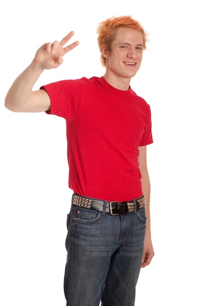 Jovem de camisa vermelha e jeans. Estúdio tiro sobre branco . — Fotografia de Stock
