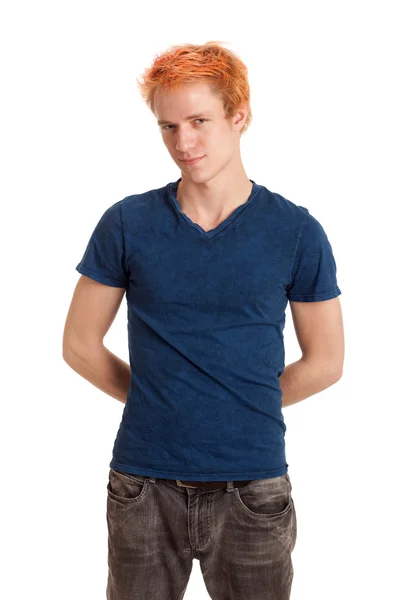 Молодий чоловік у блакитній сорочці та джинсах. Студійний знімок над білим . — стокове фото