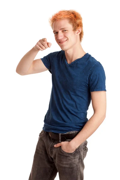 Young man in a blue shirt and jeans. Studio shot over white. — Stock Photo, Image