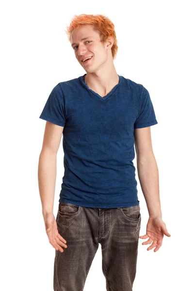 Młody człowiek w niebieska koszula i jeansy. łapka na biały. — Zdjęcie stockowe
