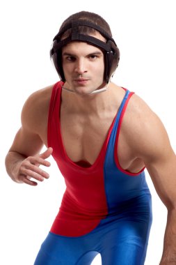 Young adult male wrestler. Studio shot over white. clipart