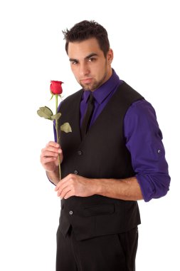 Well dressed young man with a single red rose. clipart