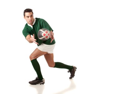 Male rugby player. Studio shot over white. clipart