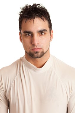 Young man in a soaking wet white shirt. clipart