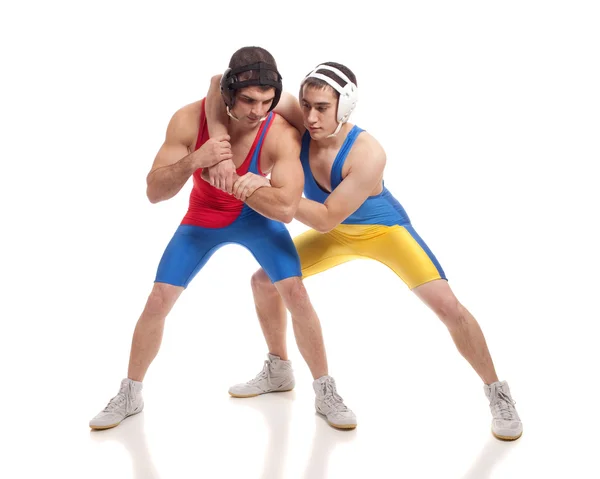 Two male wrestlers. Studio shot over white. — Stock Photo, Image