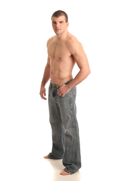 Przystojny mężczyzna w dżinsach — Zdjęcie stockowe