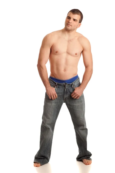 Hombre sin camisa en pantalones vaqueros — Foto de Stock