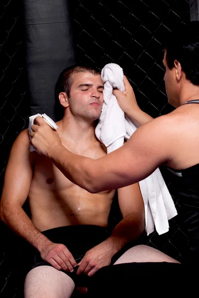 Mixed martial artist with corner man — Stock Photo, Image