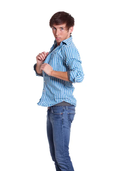 Junger Mann in blauer Jeans und Hemd. Studioaufnahme über Weiß. — Stockfoto
