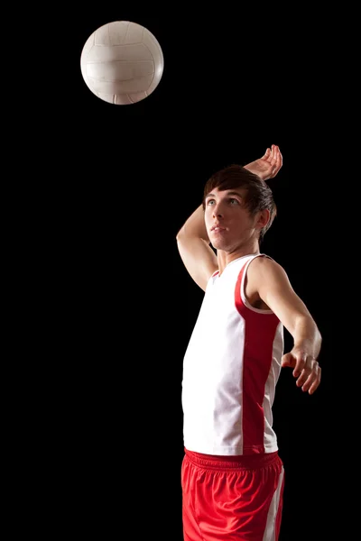 Mužský volejbalový hráč. Studio záběr nad černou. — Stock fotografie