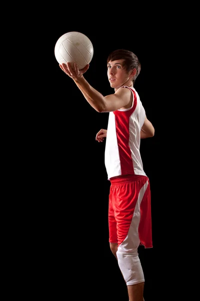 Männlicher Volleyballspieler. Studioaufnahme über Schwarz. — Stockfoto