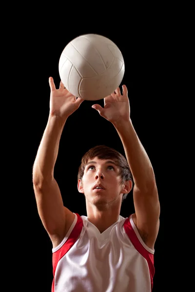 Mužský volejbalový hráč. Studio záběr nad černou. — Stock fotografie