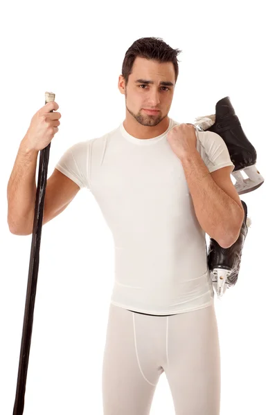 Спортивный юноша с хоккейным снаряжением . — стоковое фото