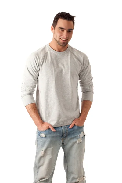 Jeune homme en jean et pull. Studio tourné sur blanc . — Photo