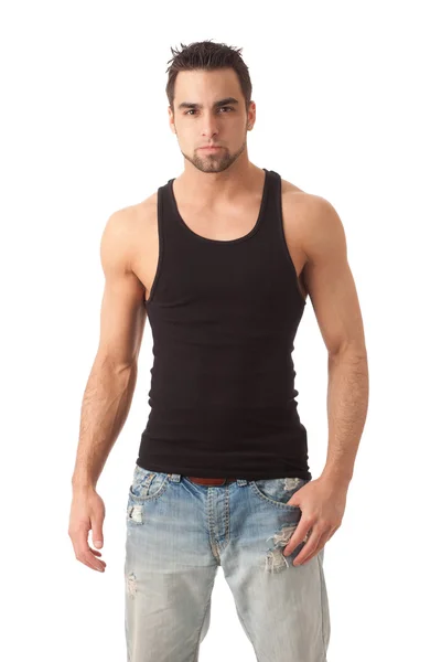 Hombre joven en jeans y camiseta negra. Estudio filmado sobre blanco . —  Fotos de Stock