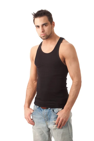 Młody człowiek w dżinsy i czarny podkoszulek. łapka na biały. — Zdjęcie stockowe