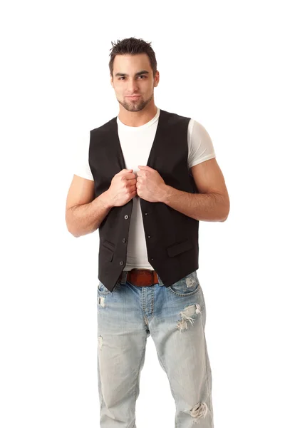 Jonge man in jeans en vest. studio opname over Wit. — Stockfoto