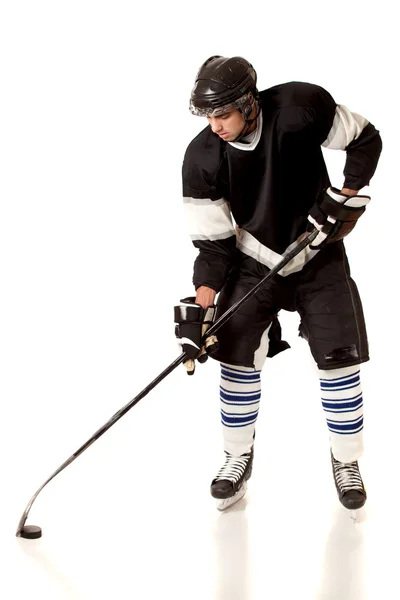 Buz hokeyi oyuncusu. Beyaz ateş studio. — Stok fotoğraf