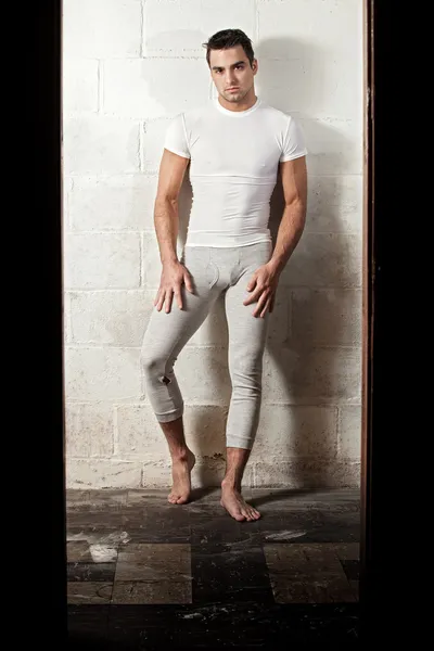 Man in long underwear and white compresion shirt. — Stock Photo, Image